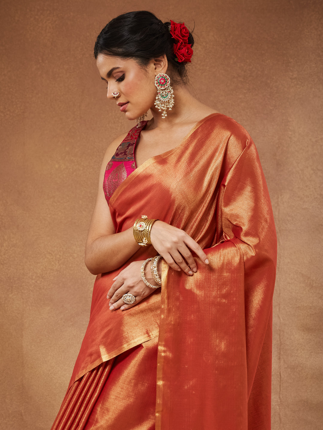 Aruna - Rust Orange Tissue Silk Saree with Tassel Pallu