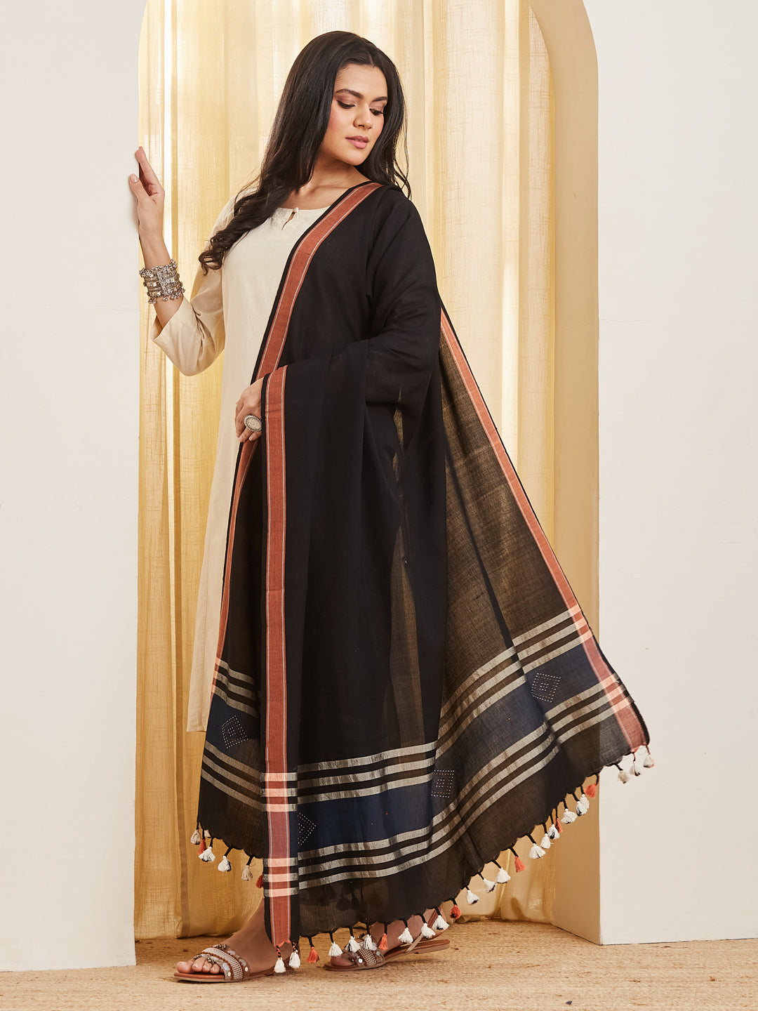 Kajal black and copper dupatta draped