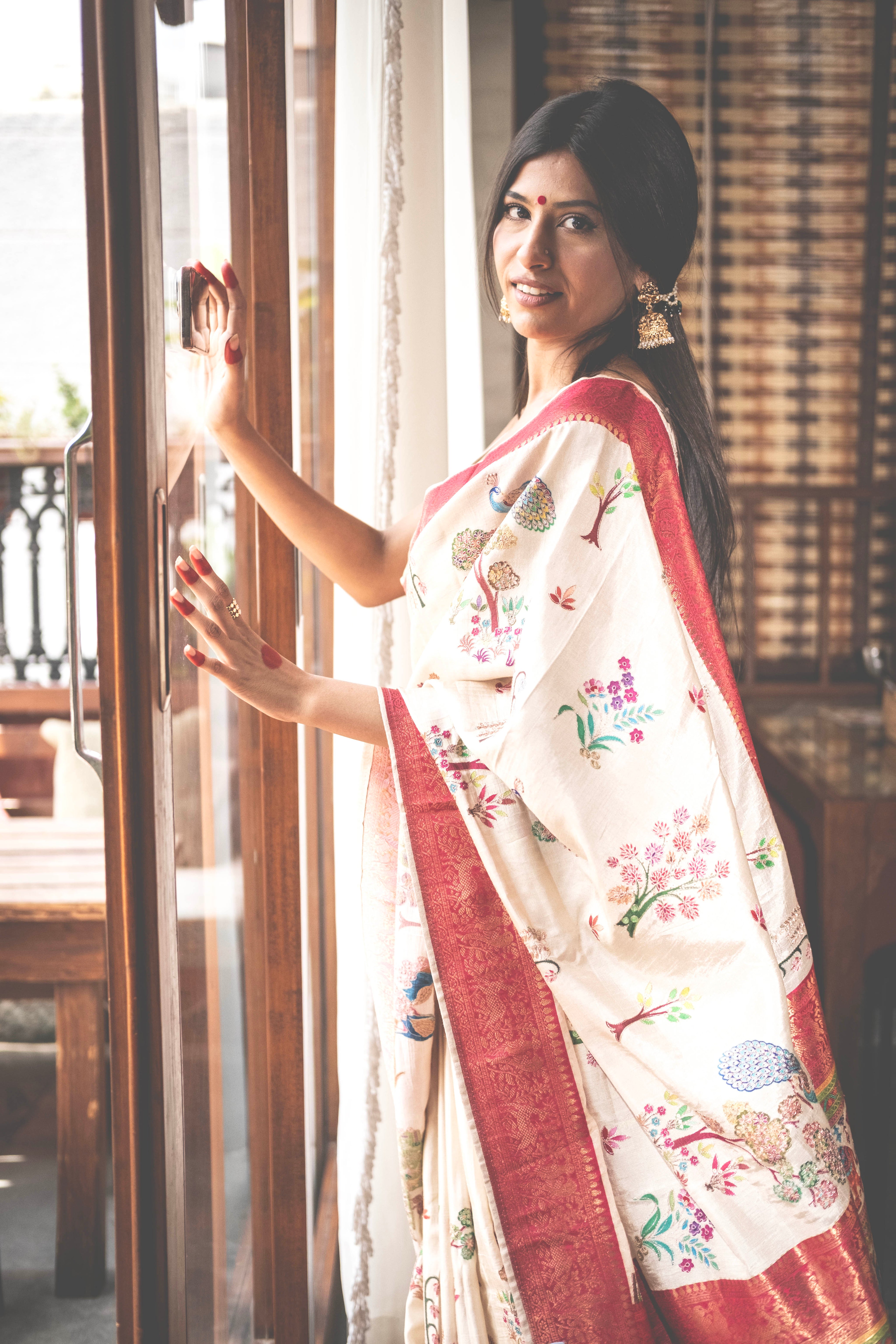 Aparajita Radha ivory hand-painted Kalamkari silk saree with red pallu