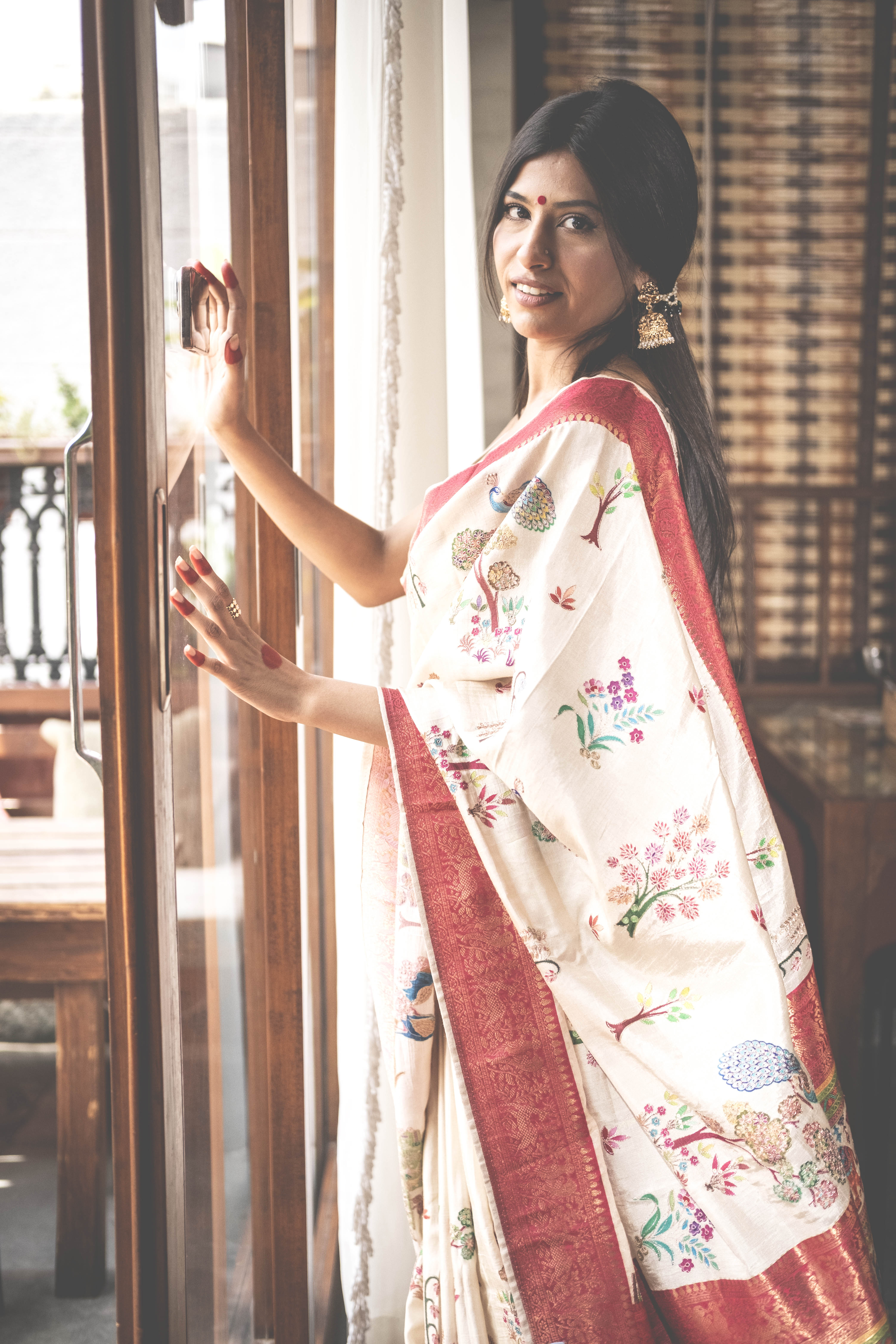 Aparajita Radha ivory hand-painted Kalamkari silk saree with red pallu