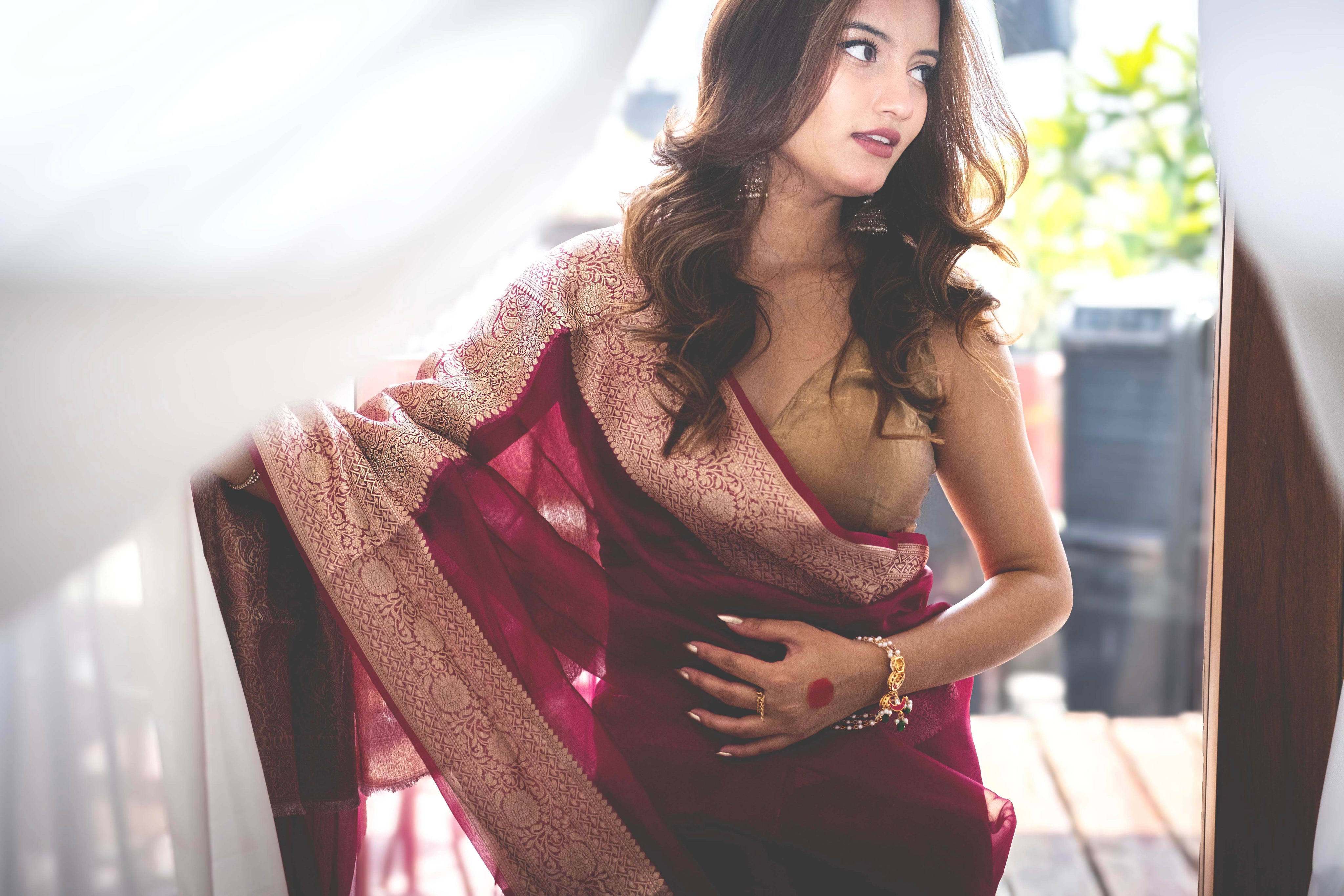 Aparajita Gulaabo rani pink tissue silk saree, draped on model