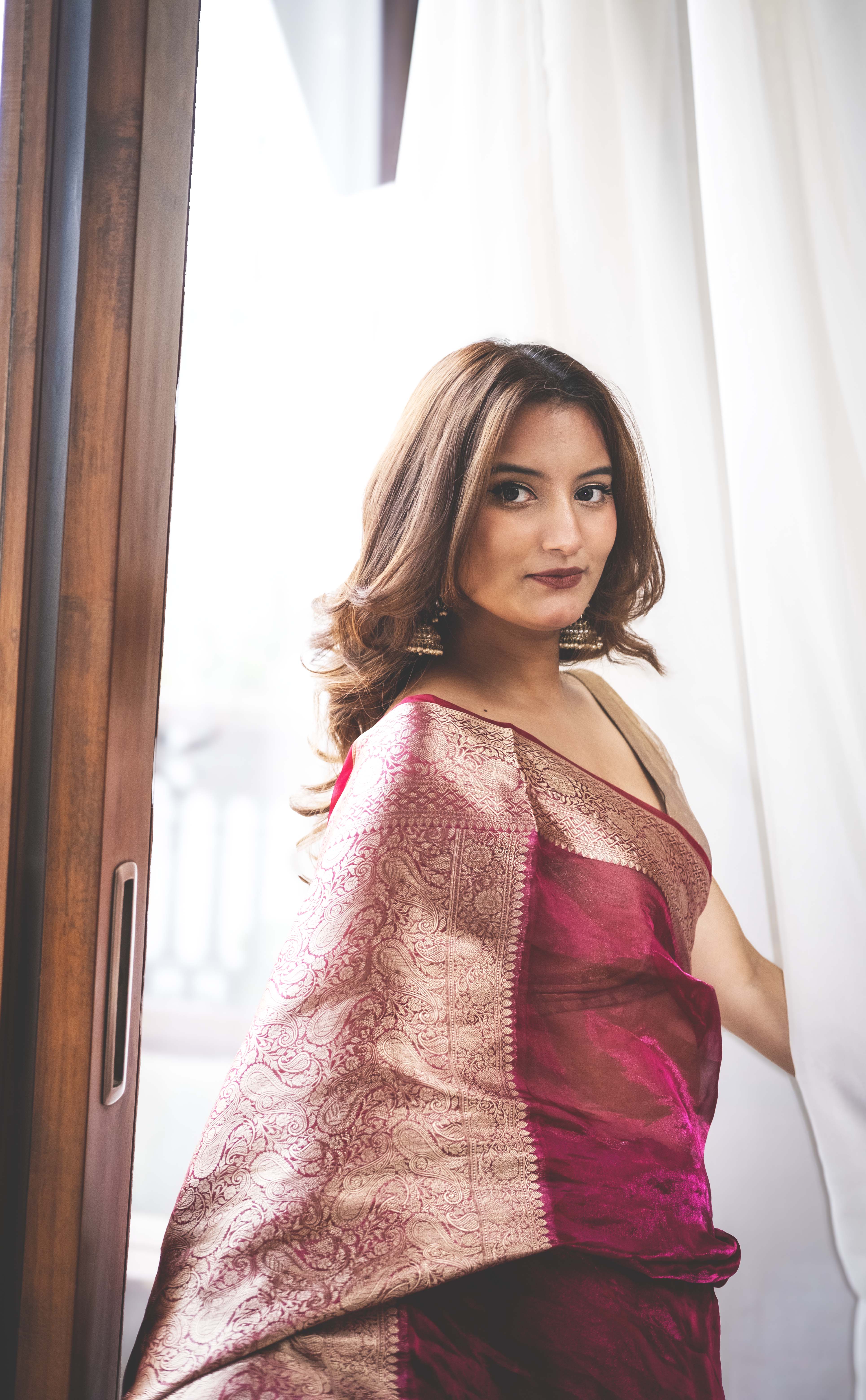 Aparajita Gulaabo rani pink tissue silk saree with antique gold border