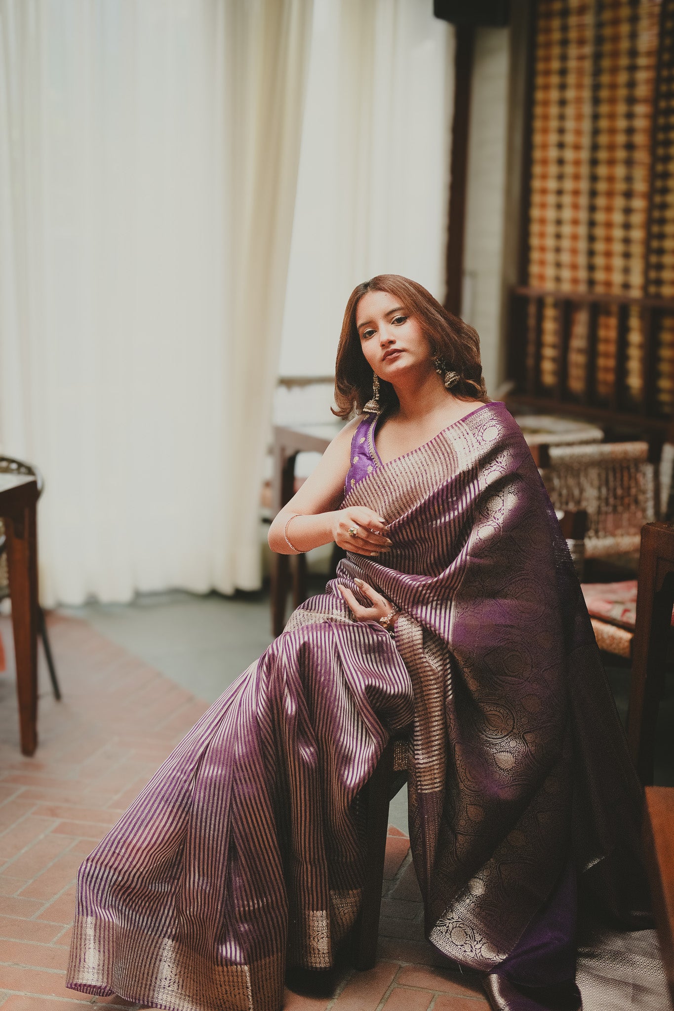 Aparajita Jamuna purple striped tissue silk Banarasi saree, styled lifestyle look