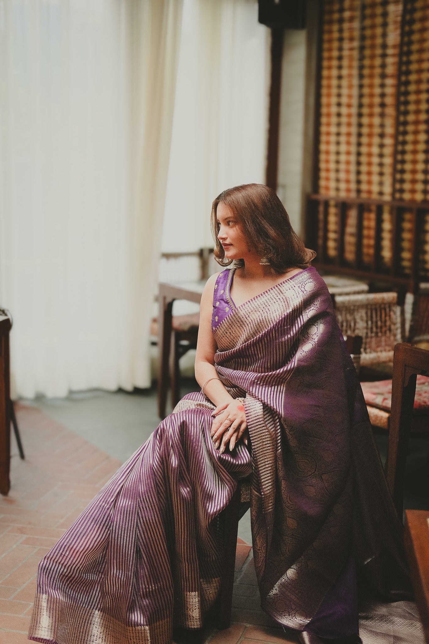 Aparajita Jamuna purple striped tissue silk Banarasi saree, draped