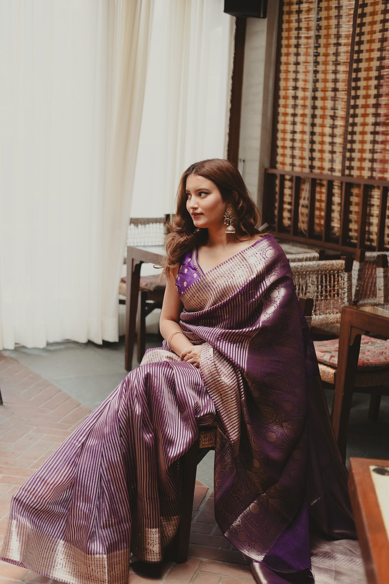 Aparajita Jamuna purple striped tissue silk Banarasi saree, draped on model
