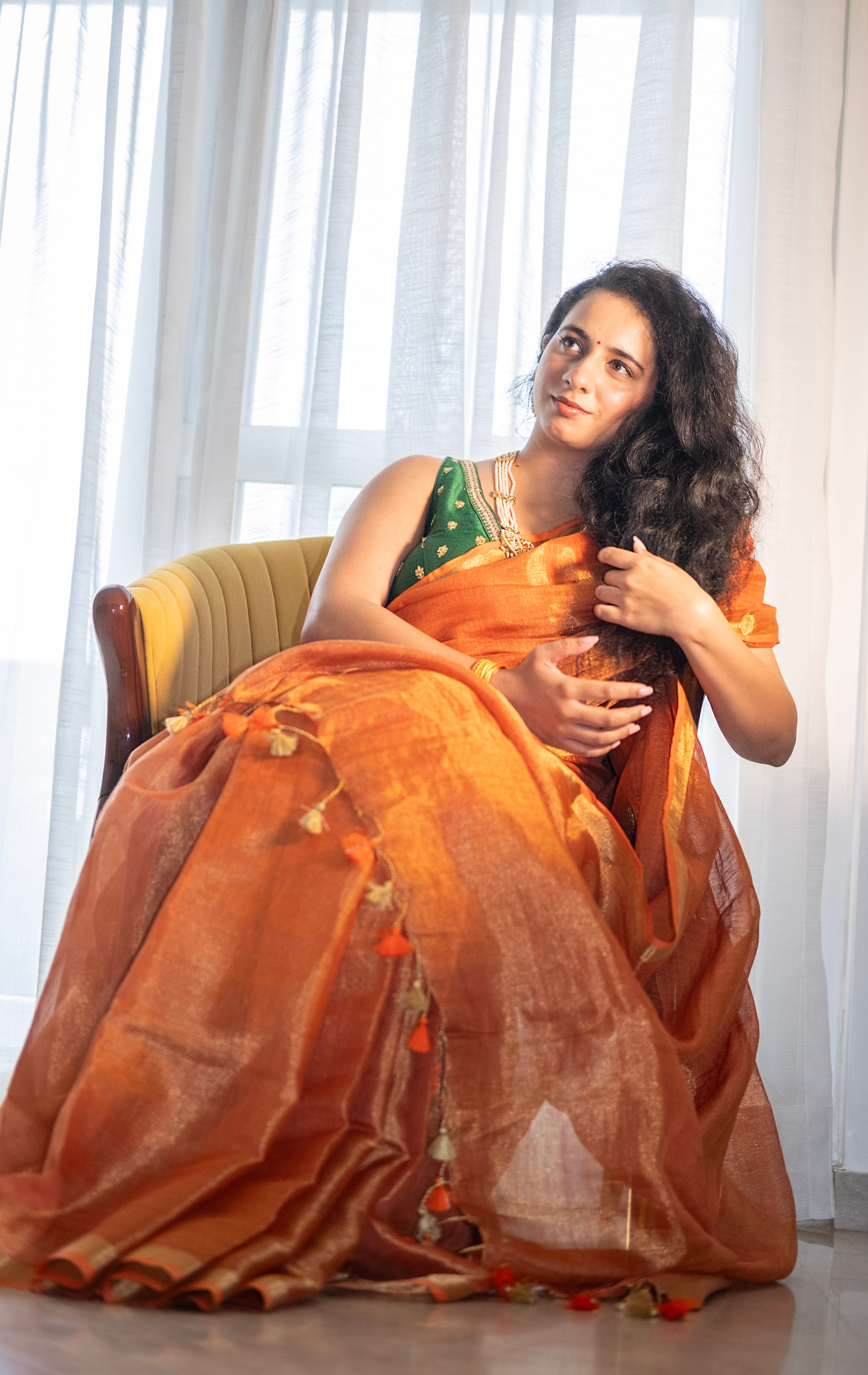 Bhor - Metallic Orange Tissue Silk Saree with Gold Border