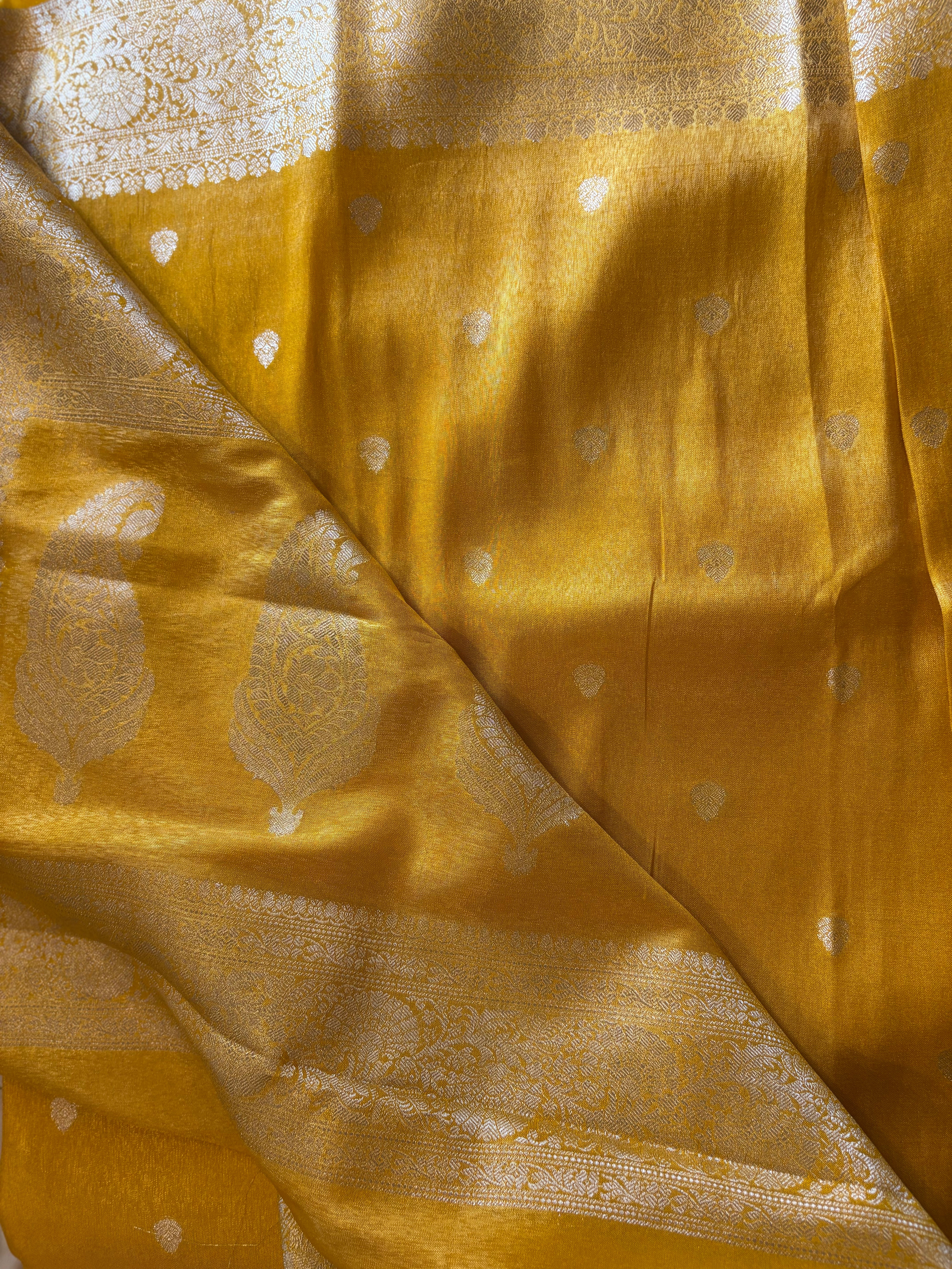 Aparajita Swarna mustard yellow Katan tissue silk Banarasi saree, drape detail