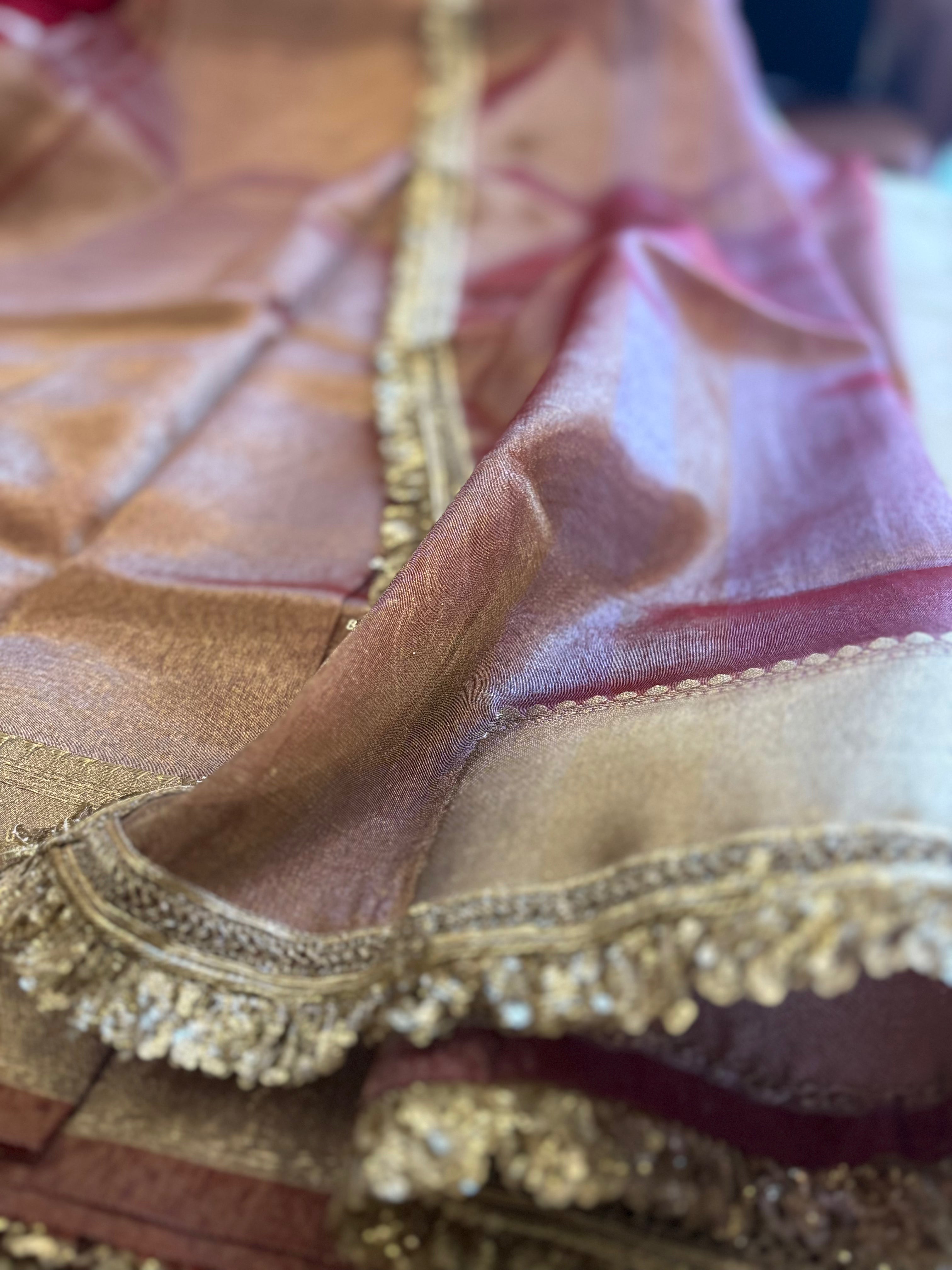 Aparajita Vishkanya coffee brown tissue silk saree with lace work, draped
