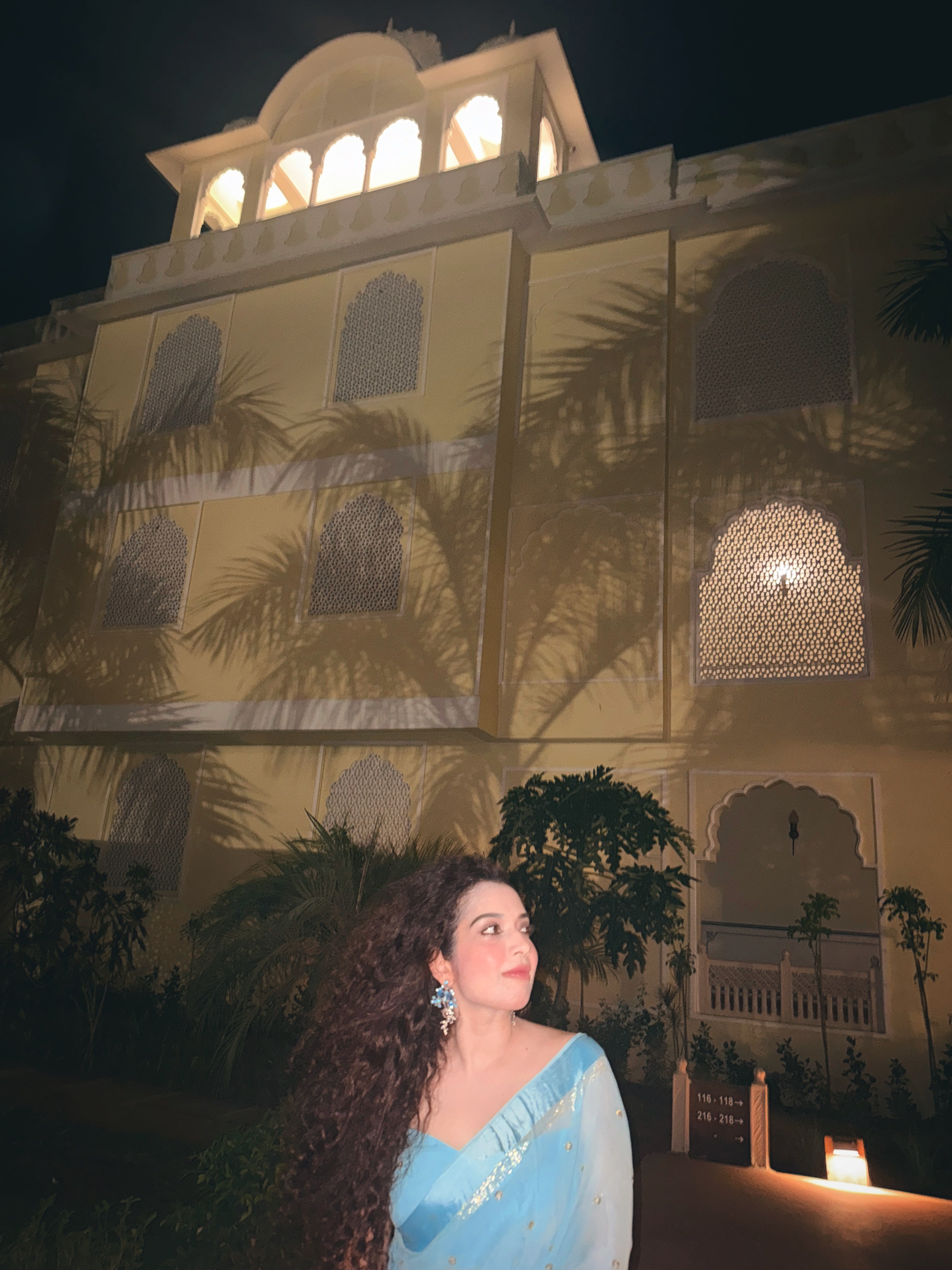 Aparajita Aasmani sky blue Banarasi silk saree with sequin work, draped on model