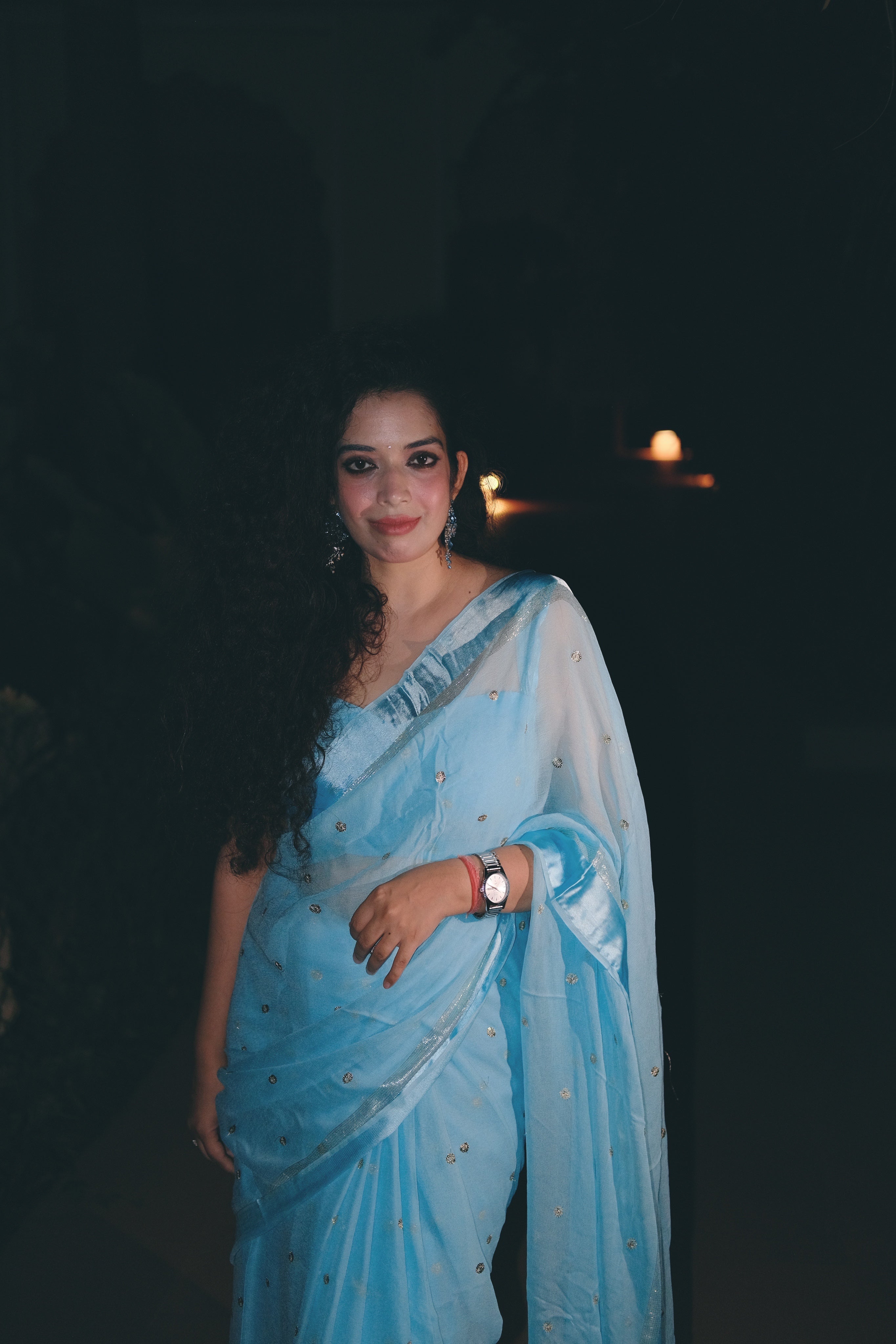 Aparajita Aasmani sky blue Banarasi silk saree with sequin work, styled lifestyle look