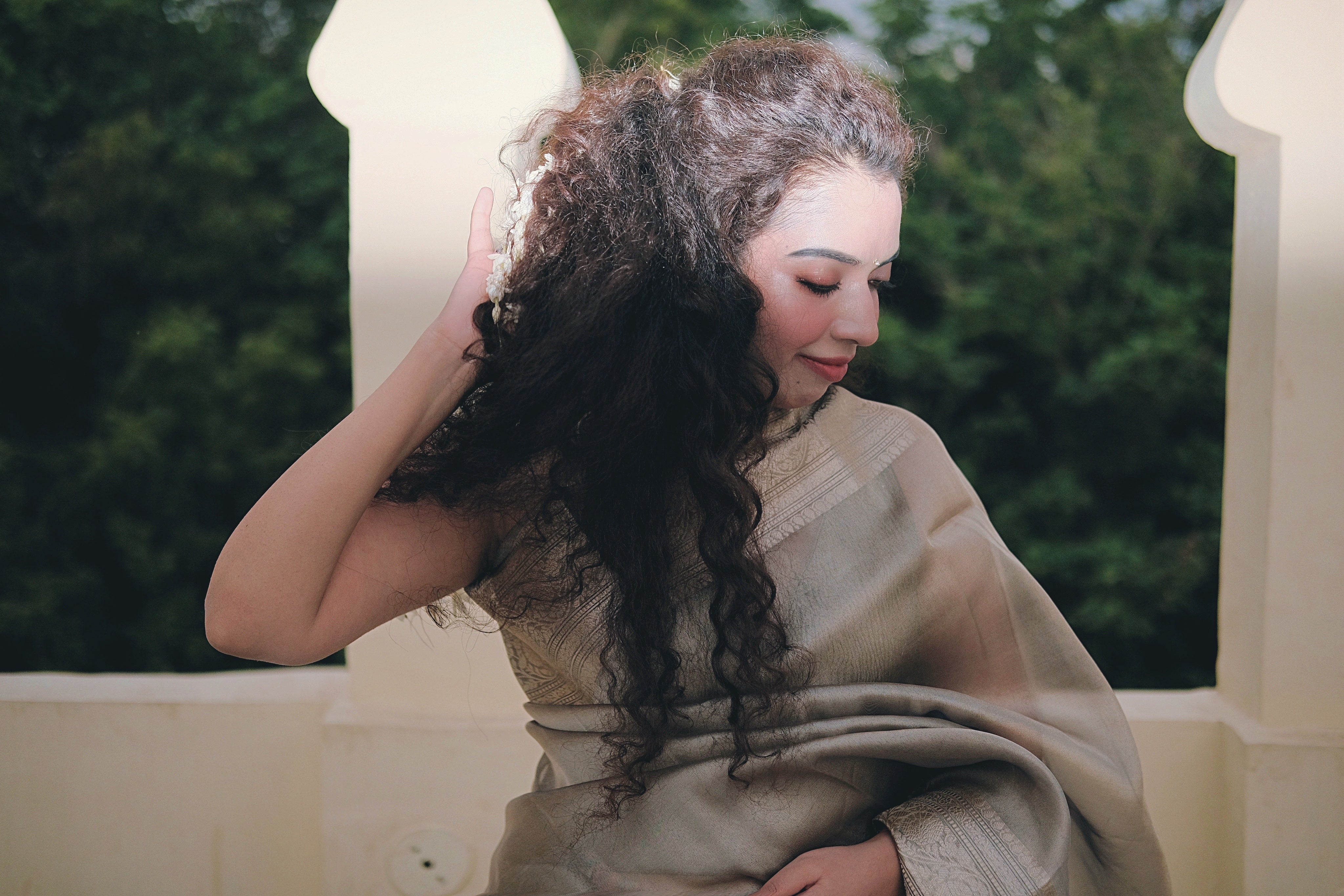 Aparajita Kansya antique gold bronze tissue silk saree, styled outdoor portrait