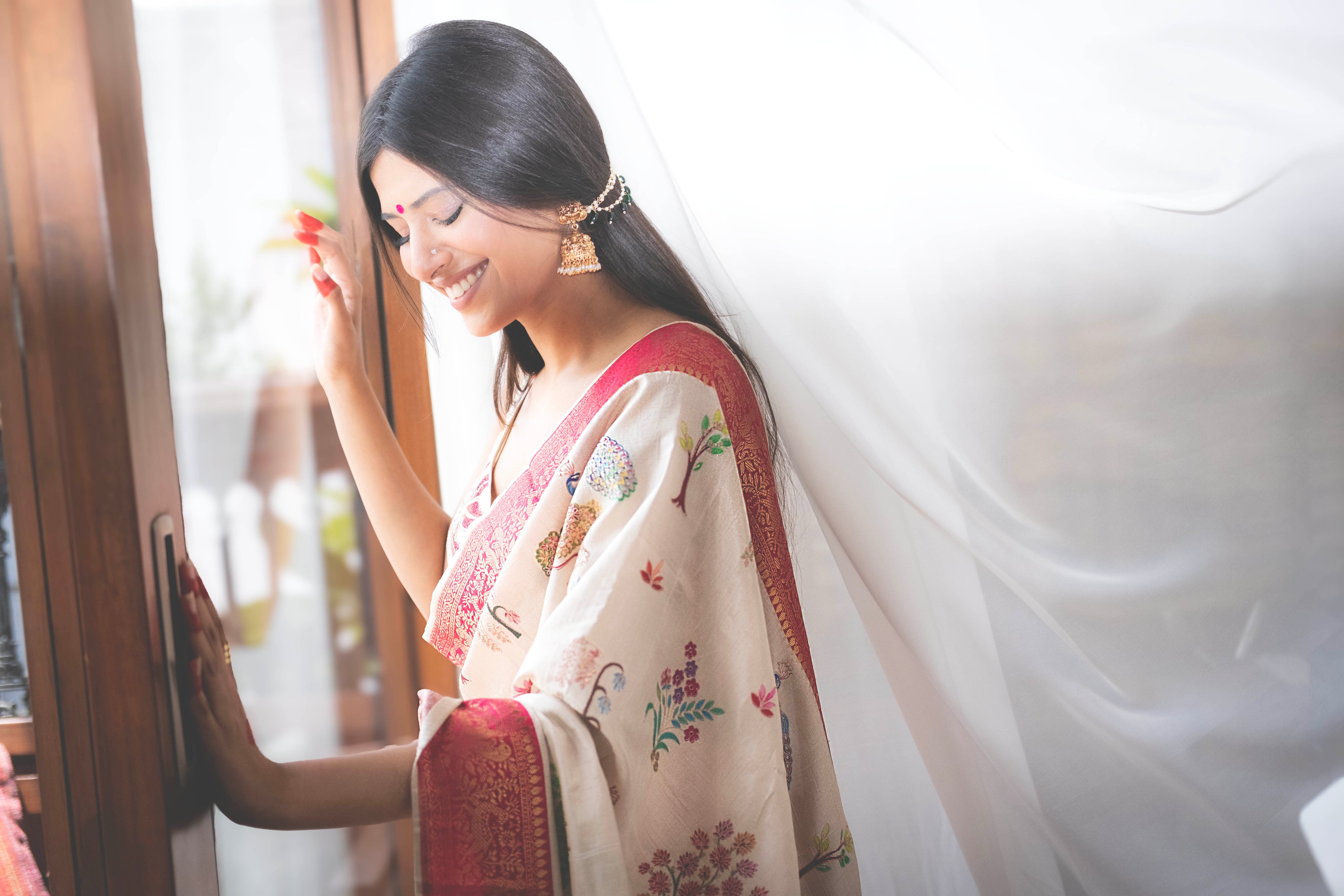 Aparajita Radha ivory hand-painted Kalamkari silk saree, drape and fall detail